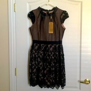 Dress size 2xl, black and Beige flower print black sheer over beige,
Brand YBKCP